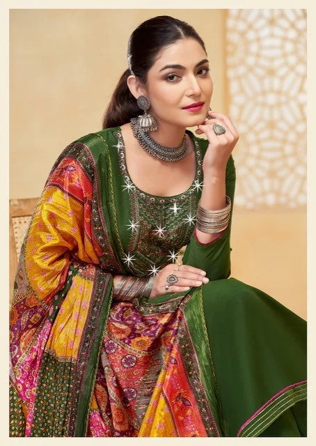 GANESH JI NIGAR VOL 1 RAYON EMBROIDERY SUITS 17.jpg