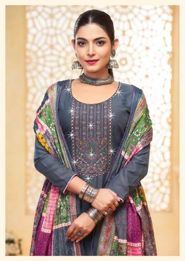 GANESH JI NIGAR VOL 1 RAYON EMBROIDERY SUITS 5.jpg