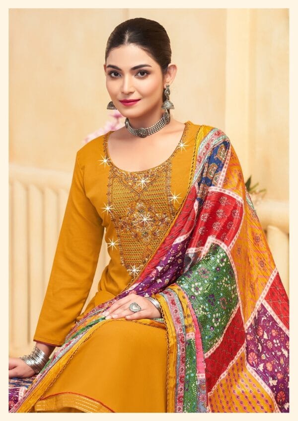 GANESH JI NIGAR VOL 1 RAYON EMBROIDERY SUITS 7.jpg
